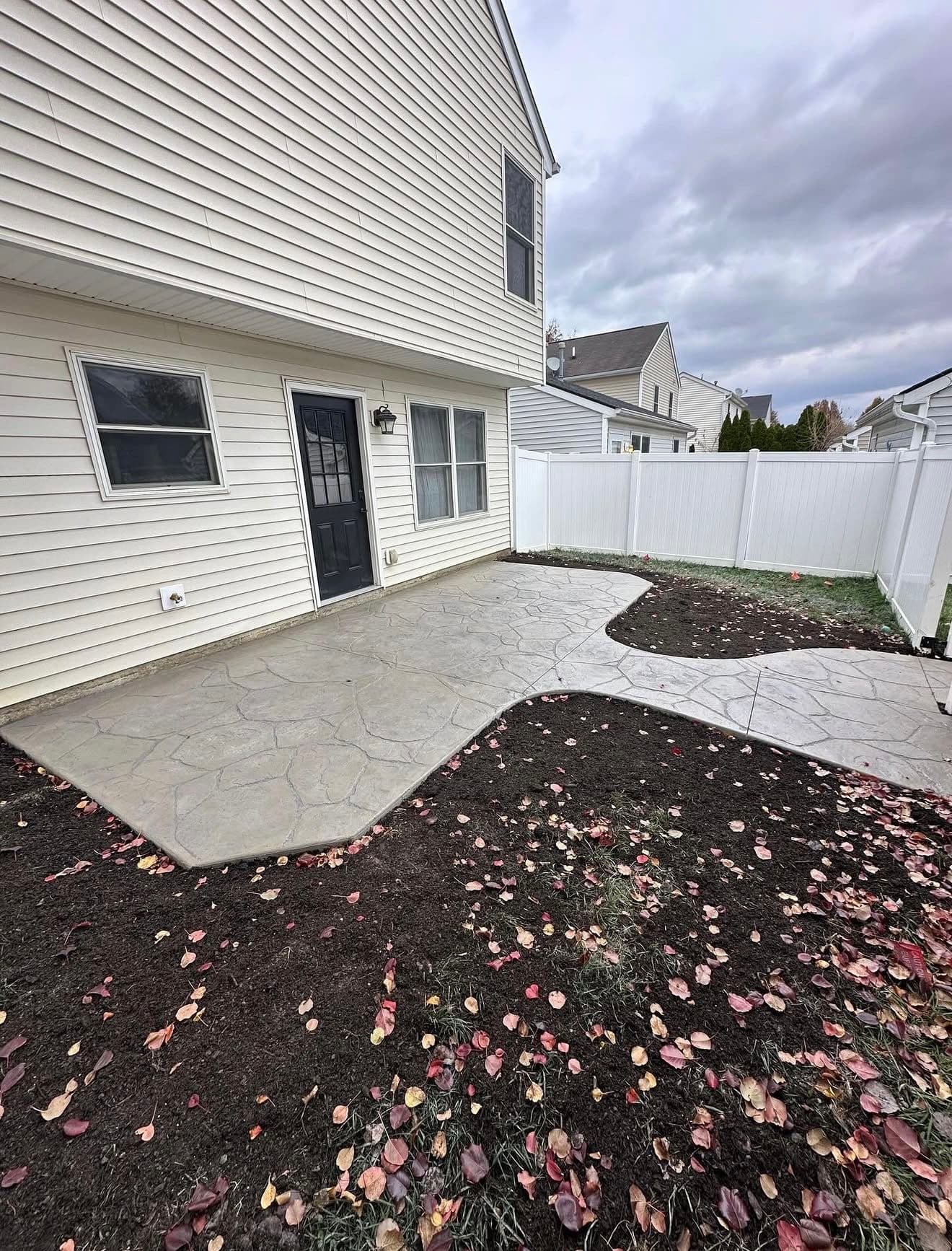 Gallery photos for Stamped Concrete Patio With Natural Stone Texture Changes the Whole Backyard: Image #1